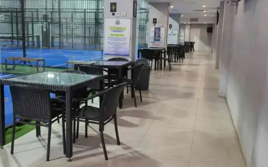 Tables beside the courts