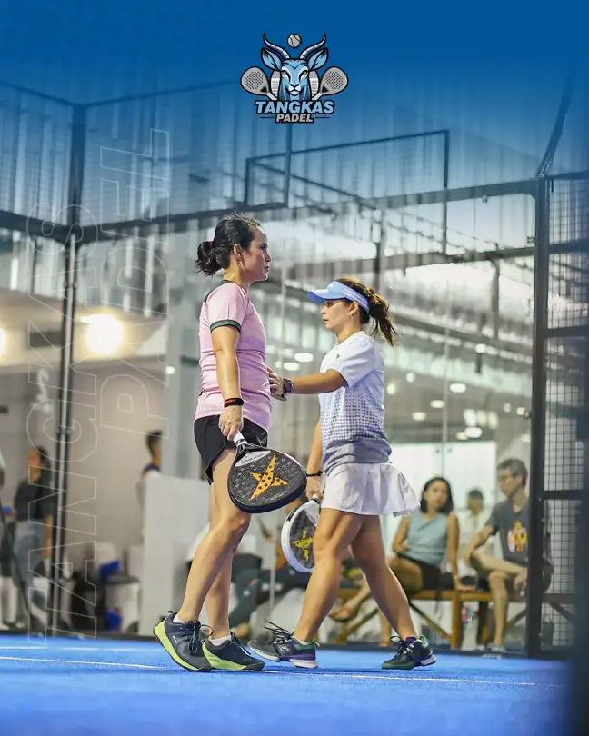 Two players walking on court