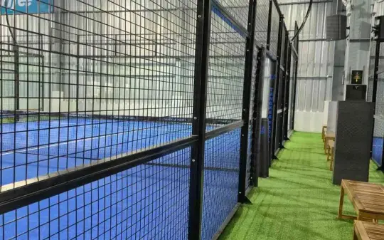 Courts lined with green turf edges